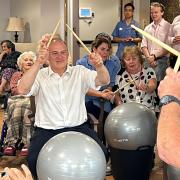 Liberal Democrat leader Sir Ed Davey takes part in a drumtastic class with residents of Abbotswood Court Care Home in Romsey. Picture: LDRS