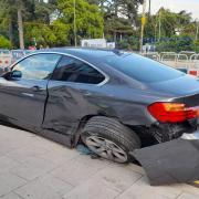 A grey BMW was badly damaged in the crash