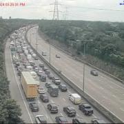 Traffic on the M25 near the junction with the M3 after an HGV fire