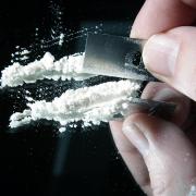 An uninsured and unlicenced driver was caught with cocaine and amphetamine
