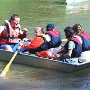 Young carers festival at YMCA Fairthorne Manor - Fun on the river in canoes..