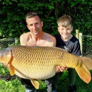 Paul and Frank Johnson with the 40lb carp fish in the New Forest
