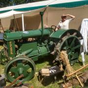 Debbie Major with one of the vintage farm vehicles used to highlight the work of the Women's Land Army during the Second World War