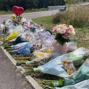 Floral tributes have been paid to the 20-year-old motorcyclist