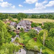 Look inside this impressive family home with home cinema, pool and gym