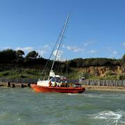 Lifeboat crew rescues couple after yacht got stuck in mud