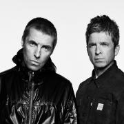 Liam Gallagher, left, and his brother Noel will be reunited for their first Oasis gig in Manchester for almost 16 years (Simon Emmett/Fear PR/PA)