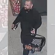 CCTV footage of a man police would like to speak to after a shoplifting incident at Aldi in Chandler's Ford