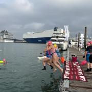 Brave swimmers took the plunge in open water at the Southampton International Boat Show for charity