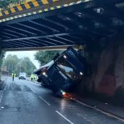 Greatbridge Road closed after lorry gets stuck underneath railway bridge - Live