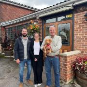 Eric Light (right) is handing over the keys to The Salmon Leap to son Shane and his partner Sanna Byles