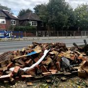 Resident's destroyed front garden on Bitterne Road West after a car flattened his brick wall, greenhouse and compost heap.