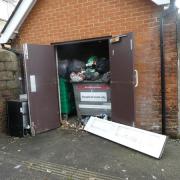 Housing provider apologises for overflowing rubbish that spills out onto the road