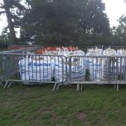 Large bags of rocks positioned inside the entrance to Royal Victoria Country Park.