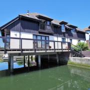 The Hythe waterside home is located on White Heather Court