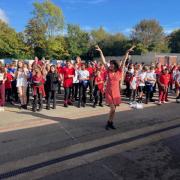 Staff and children showcase their moves in dance extravaganza