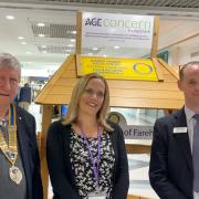 Bob Hitchins, Fareham Rotary Club President, Sarah Jacobs from Age Concern Hampshire, and Mike Taylor, Centre Manager at Fareham Shopping Centre