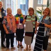 The 'Knit and Natter' club at Alston House Care Home, Leigh Road, produced a 45-metre section of the giant scarf