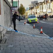 Forensics officers were on the scene on Sunday morning