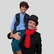 Mike Pavitt as Scrooge with Tiny Tim