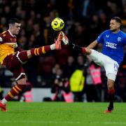 Motherwell's Lennon Miller (left) has been linked to Saints in Scotland