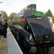 CHANDLERS FORD STATION WAS OPENED BY CHARLIE DIMMOCK THE STEAM TRAIN WITH CHARLIE DIMMOCK COMES INTO THE STATION... dig12570