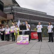 Musicians' Union members in the Welsh National Opera orchestra take part in industrial action