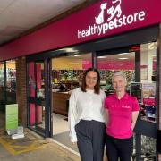 Carswell Gould Marketing Executive Maddie Gulliver and Healthy Pet Store Managing Director Deborah Burrows outside the Totton store