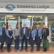 The Dawkins & Lodge Opticians team with Mr Dawkins (centre)