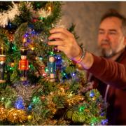 Mike decorating the Christmas tree