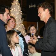 Star of White Christmas at The Mayflower Craig McLachlan turns on the Christmas lights at The Mall Marlands . Craig signs autographs for the Pegler family.