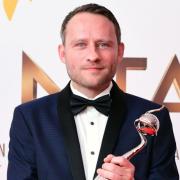 Coronation Street actor Peter Ash picking up his National Television Award