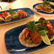 Clockwise from left: The ackee and saltfish, trini doubles and fish tacos