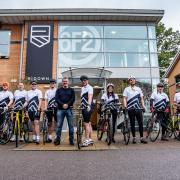 Darren Ridge (centre) with Matt Le Tissier and the cycling team at Ridown headquarters in Whiteley