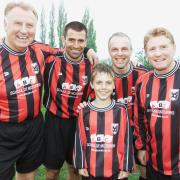 (L-R) DAVE MERRINGTON, FRANCIS BENALI, ROGER FRAPWELL, ALAN BALL. PICTURED IN FRONT STEPHEN FRAPWELL. FUNDRAISING FOOTBALL MATCH WITH TESTWOOD BAPTIST CHURCH TEAM AND OTHERS. TO MARK ROGER FRAPWELL'S DEPARTURE.