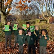 Pupils at Stanmore Primary School celebrating their latest Ofsted report