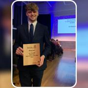 First Beaulieu River apprentice Oli Rickard with his award