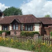 The bungalow is located in the New Forest village of Dibden