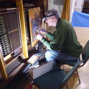 Tony King Soldering At The Console Of The Compton Organ At Thorngate Halls Nov 2024