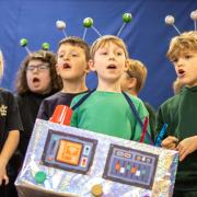 Year 2 pupils from Foxhills Infant School sing their hearts out in their fun-filled alternative nativity Christmas With The Aliens