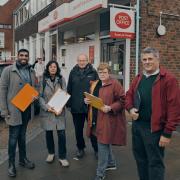 Councillors Nik Daas (left) and Sandra Gidley (second from right) petitioning outside Romsey PO