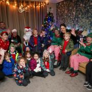 Father Christmas (David Woodley) with children from Sarisbury Infants School in the Ancasta Grove Grotto