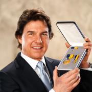 Actor Tom Cruise was presented with the US navy Distinguished Public Service Award (Ian West/PA)