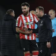 Simon Rusk and Saints former Ben Brereton Diaz (right) after defeat to Liverpool.