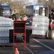 Long queues as people collect bottles of water at Places Leisure in Eastleigh.