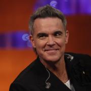 Robbie Williams during filming for the New Year’s Eve episode of The Graham Norton Show (Isabel Infantes/PA)