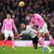 Nathan Wood in action against Fulham’s Rodrigo Muniz at Craven Cottage