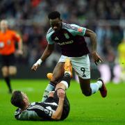 Newcastle United’s Fabian Schar (left) after being fouled by Aston Villa’s Jhon Duran (right) leading to a red card during the Premier League match at St. James’ Park, Newcastle upon Tyne. Picture date: Thursday December 26, 2024.