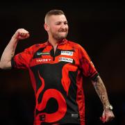 Nathan Aspinall reached the last 16 of the PDC World Darts Championship (Zac Goodwin/PA)