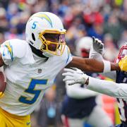 Los Angeles Chargers pushed aside New England to book their play-off place (Michael Dwyer/AP)